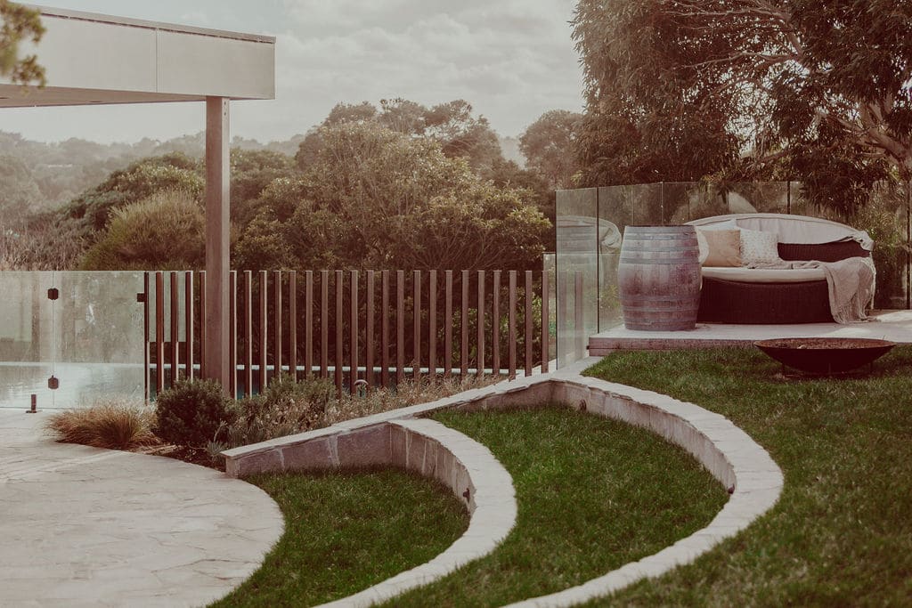 Landscaping-Mornington-Peninsula Photo of stepped landscaping with seating area